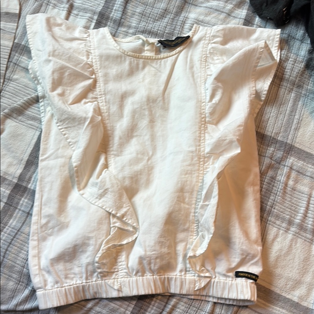 Finger In The Nose White Ruffle Blouse